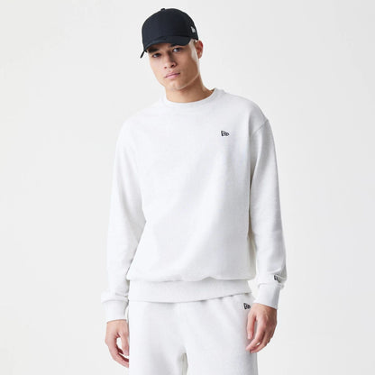 The Male model is wearing New Era Premium Essential Pastel Grey Oversized Crew Neck Sweater 1
