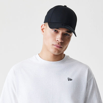 The Male model is wearing New Era Premium Essential Pastel Grey Oversized T-Shirt 4