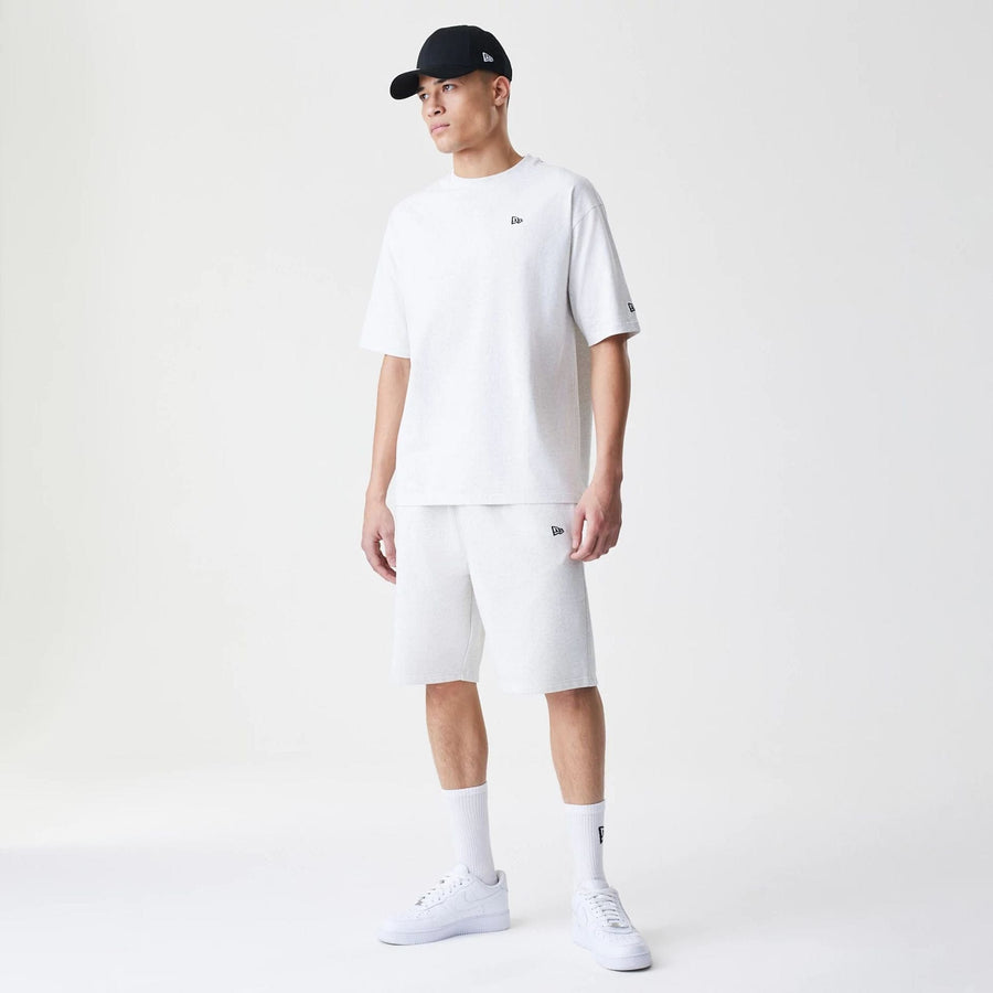 The Male model is wearing New Era Premium Essential Pastel Grey Oversized T-Shirt 8