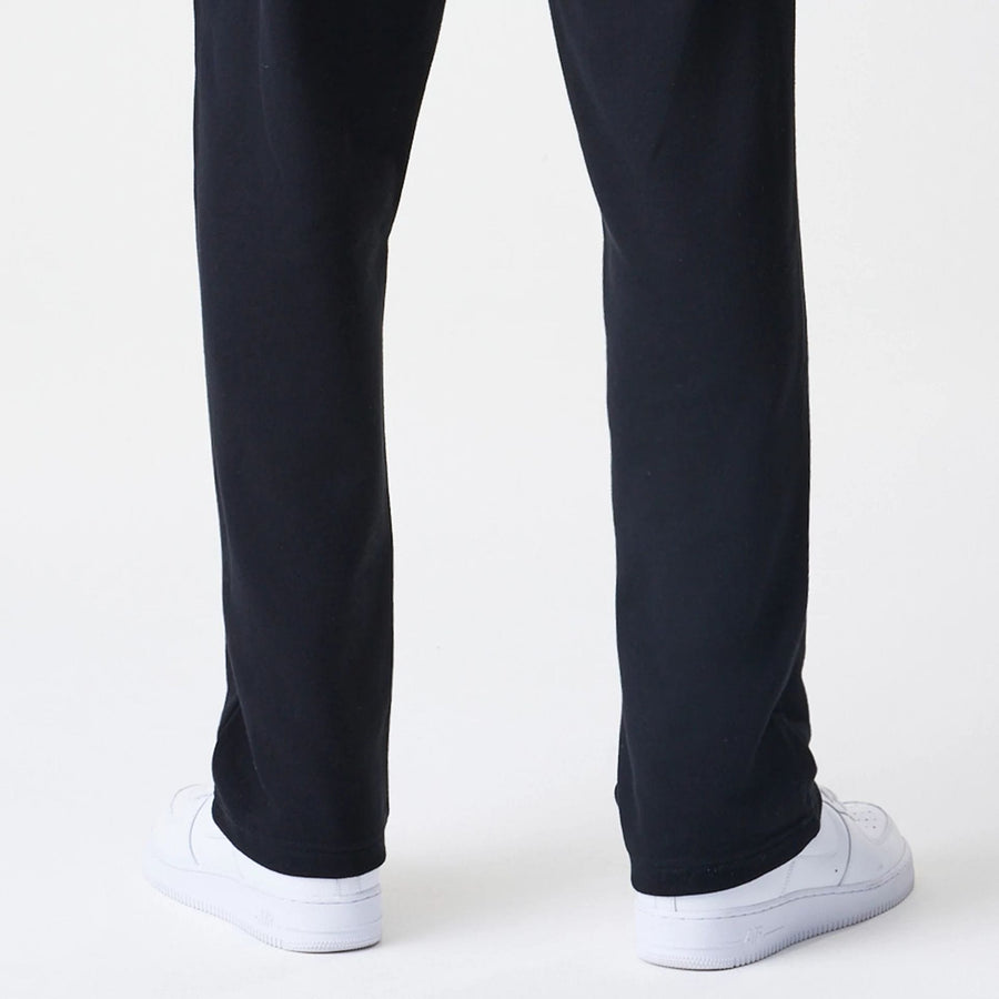 The Male model is wearing New Era Premium Essential Black Joggers 7