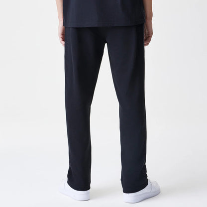 The Male model is wearing New Era Premium Essential Black Joggers 2