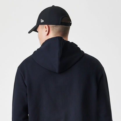 The Male model is wearing New Era Premium Essential Black Oversized Full Zip Hoodie 7