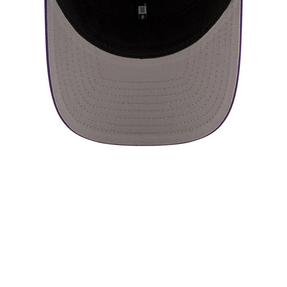 LA Lakers NBA Team Purple New Era 9FORTY M-Crown Adjustable Cap, inside view showing the grey undervisor and black sweatband with branded taping, highlighting the curved visor structure.