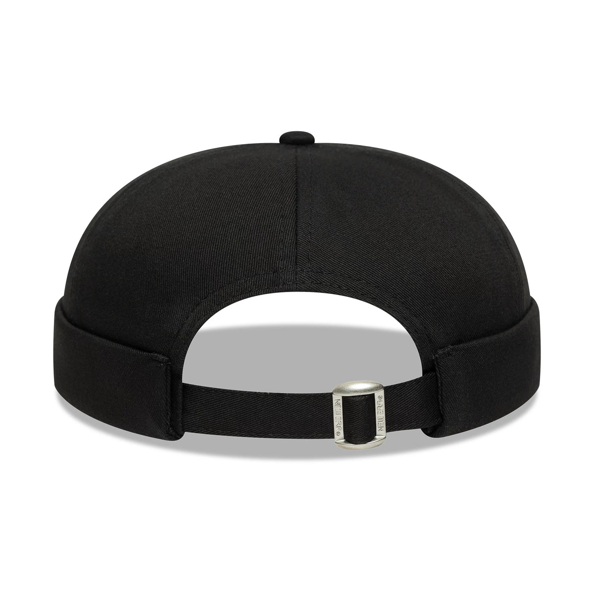 New Era Cotton Twill Black Docker Hat, rear view showing the adjustable black strap with a buckle, and the fitted black twill fabric forming the structured crown and rolled edge.