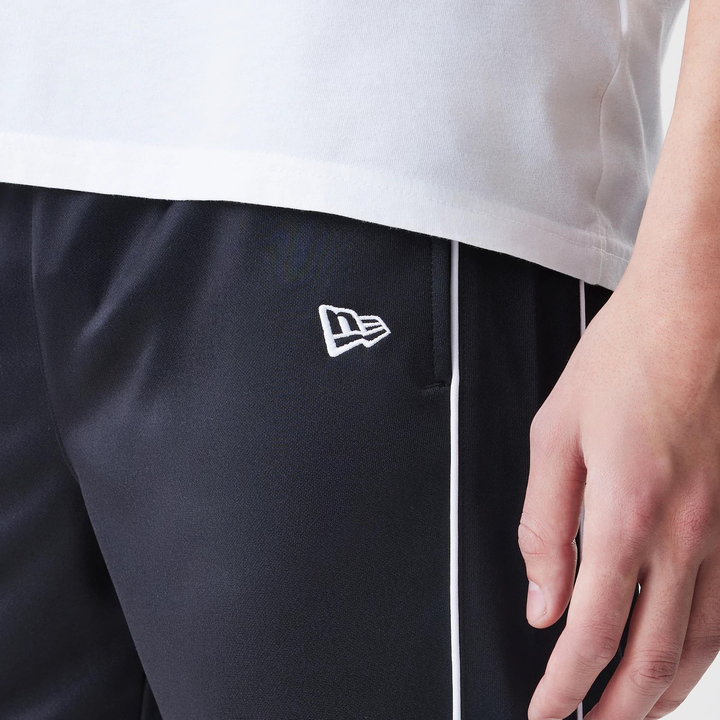 The Male model is wearing Chicago Bulls NBA Slim Black Track Pants 4