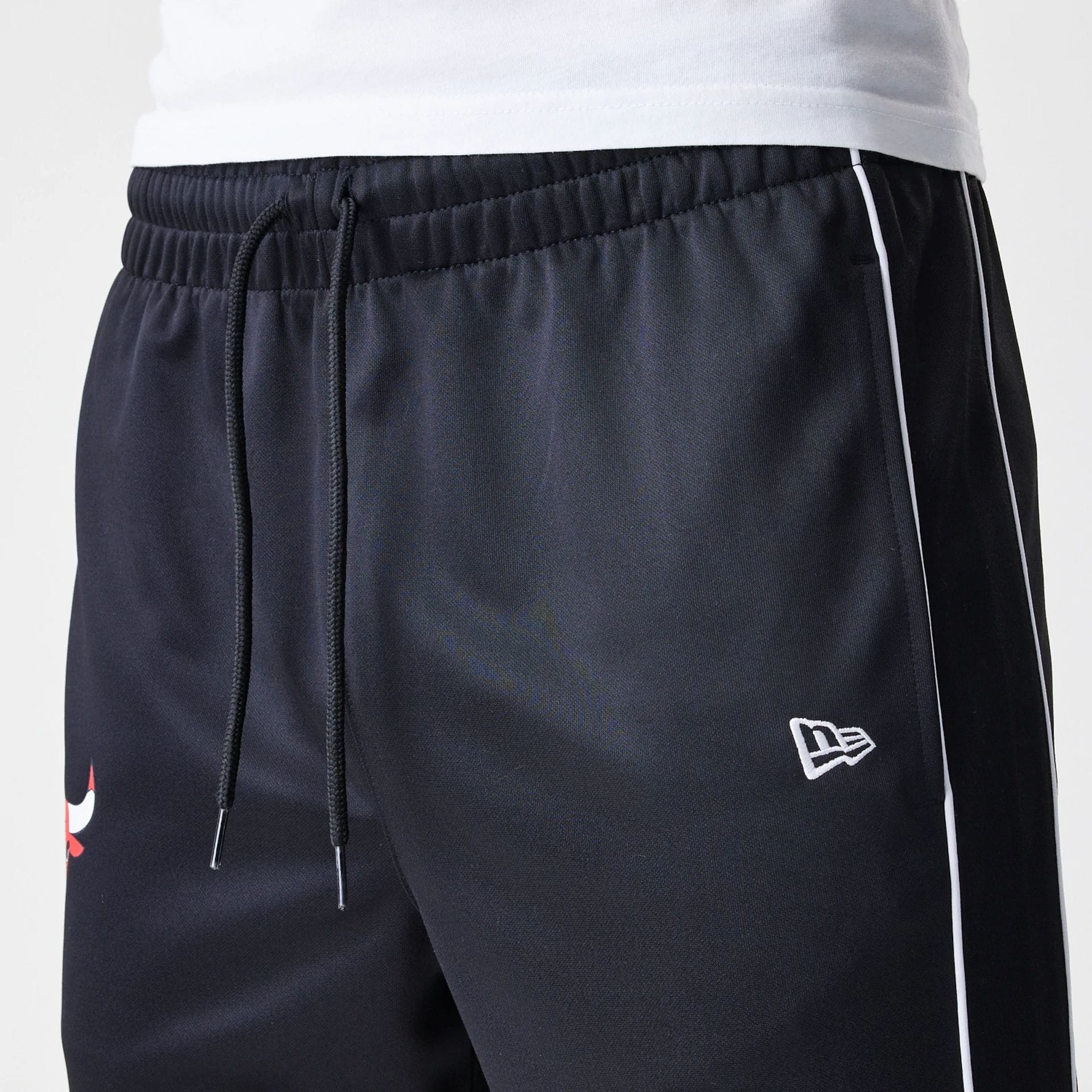 The Male model is wearing Chicago Bulls NBA Slim Black Track Pants 5