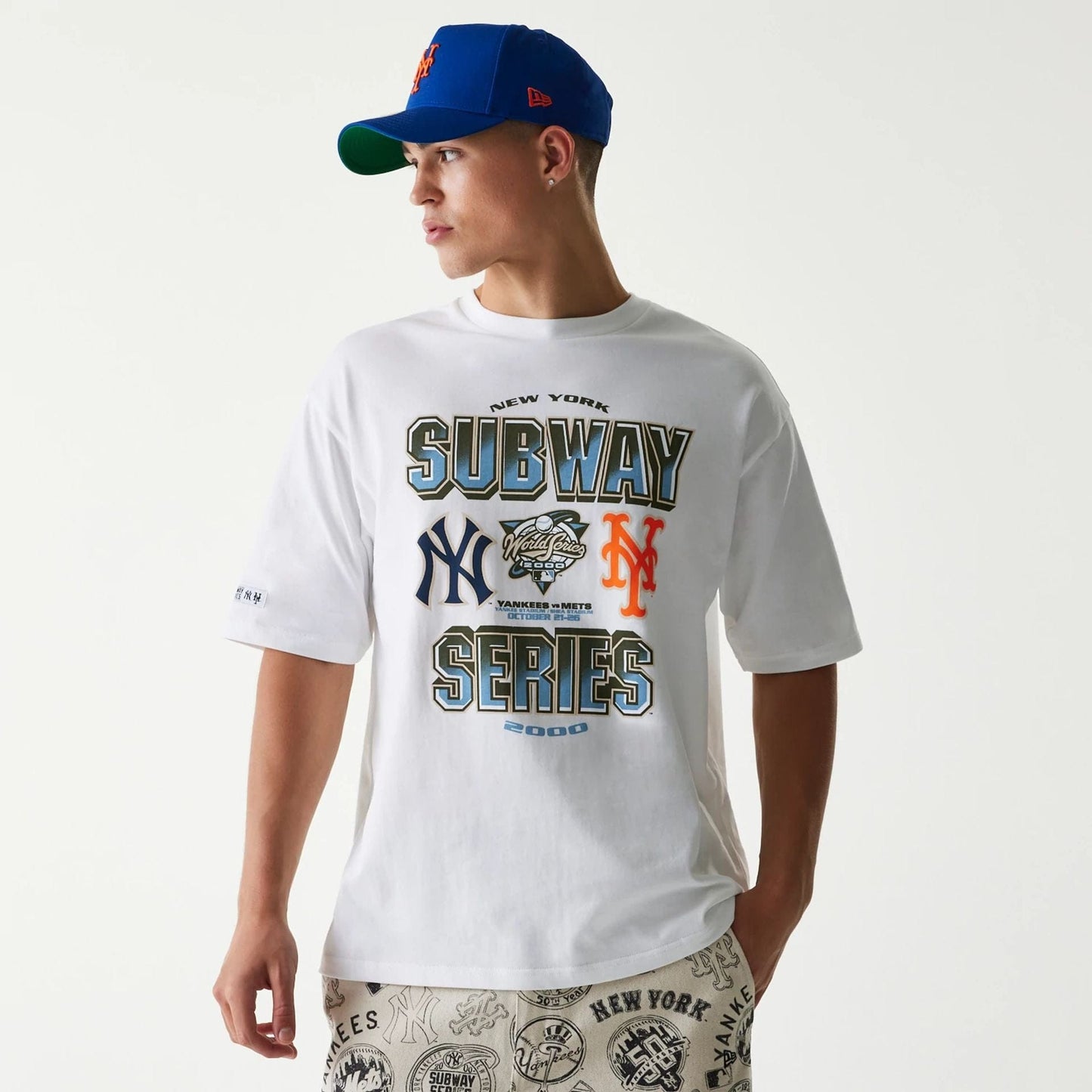 The Male model is wearing MLB Subway Series White Oversized T-Shirt 1