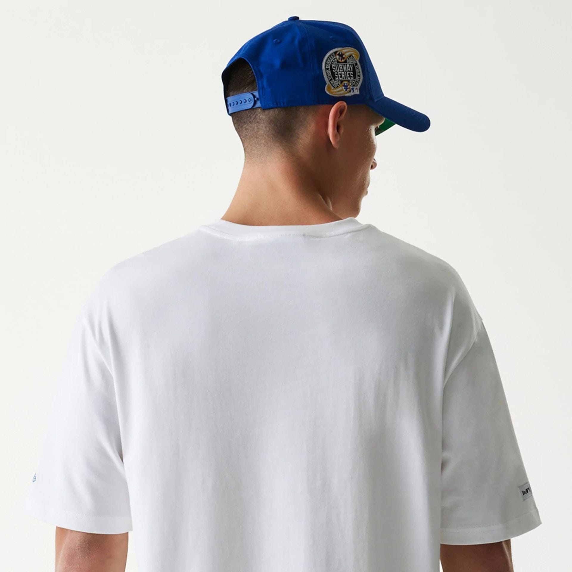 The Male model is wearing MLB Subway Series White Oversized T-Shirt 7