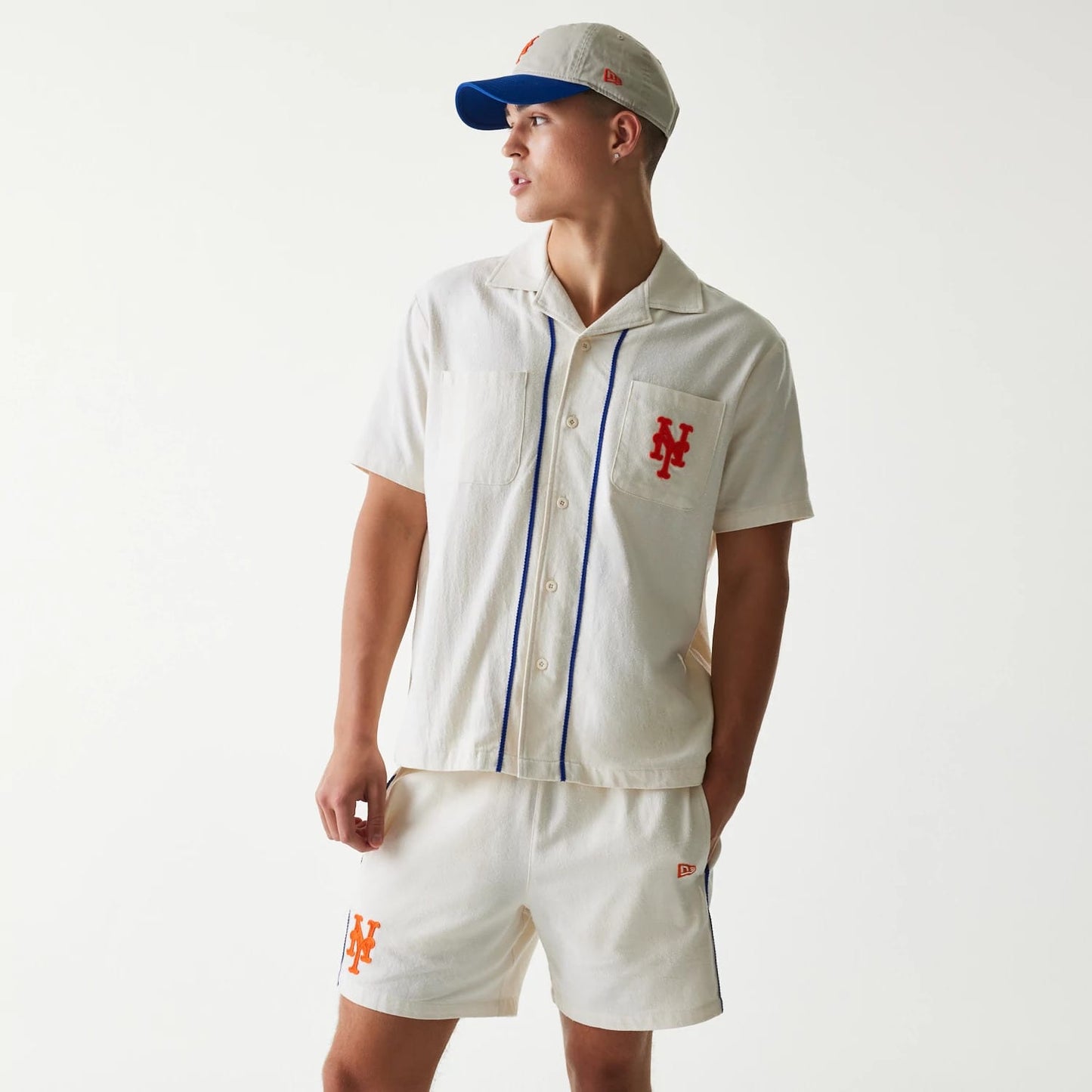 The Male model is wearing New York Mets MLB Piping Open Cream Short Sleeve Shirt 1