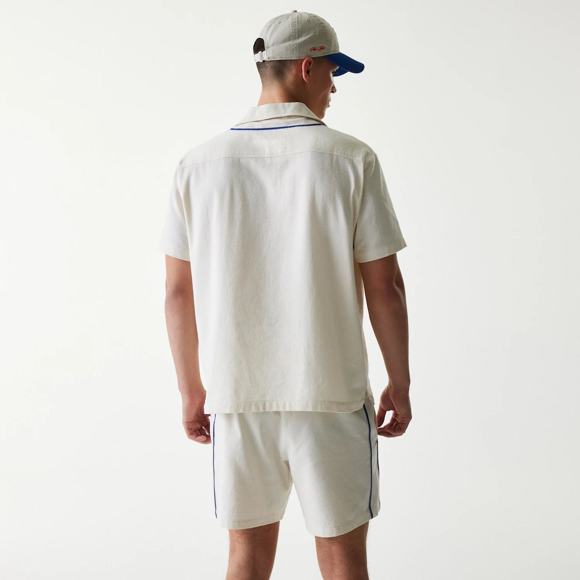 The Male model is wearing New York Mets MLB Piping Open Cream Short Sleeve Shirt 2