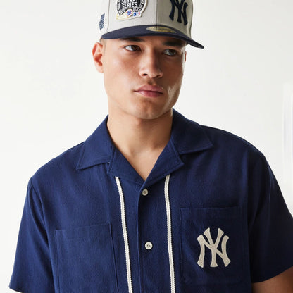 The Male model is wearing New York Yankees MLB Piping Navy Short Sleeve Shirt 6
