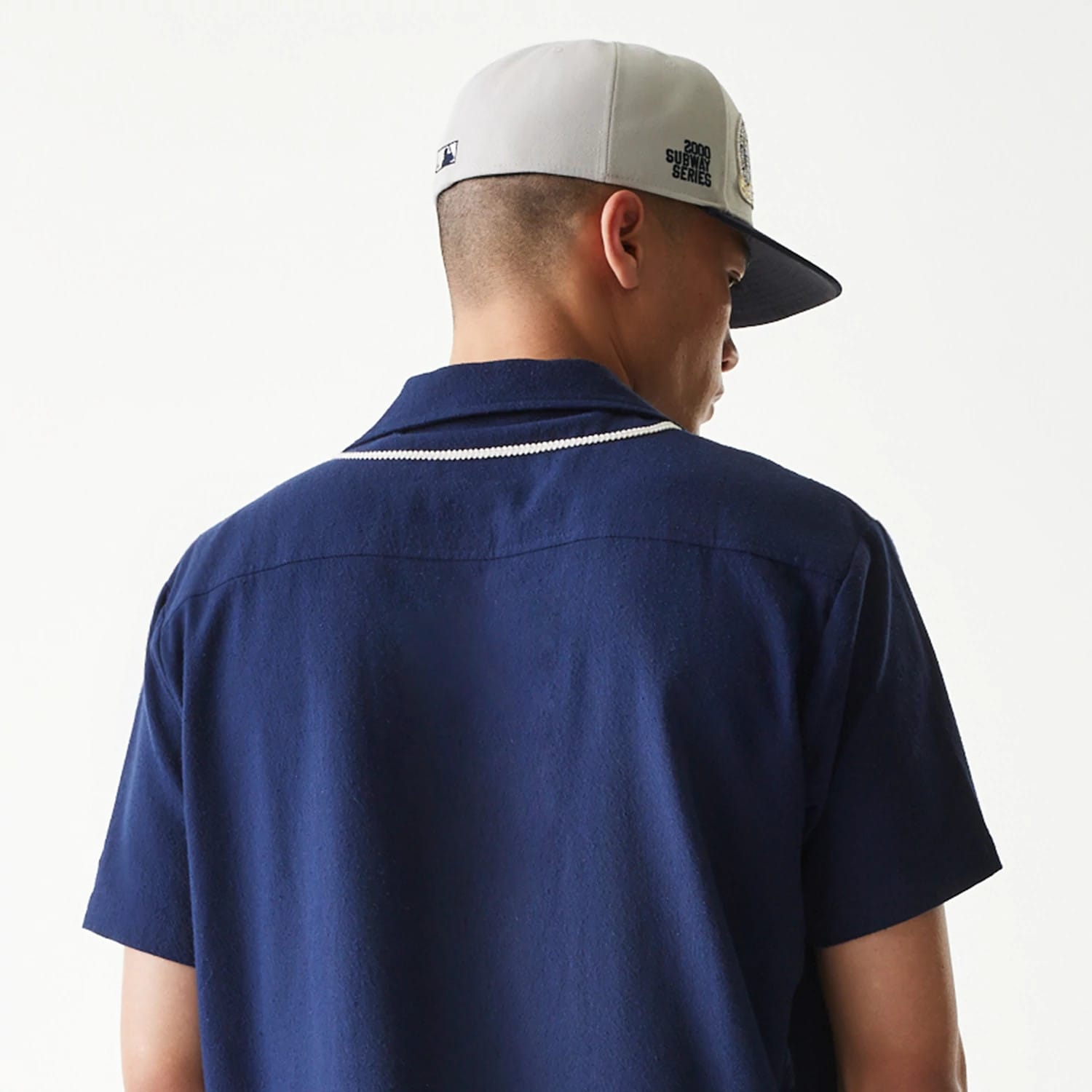 The Male model is wearing New York Yankees MLB Piping Navy Short Sleeve Shirt 7