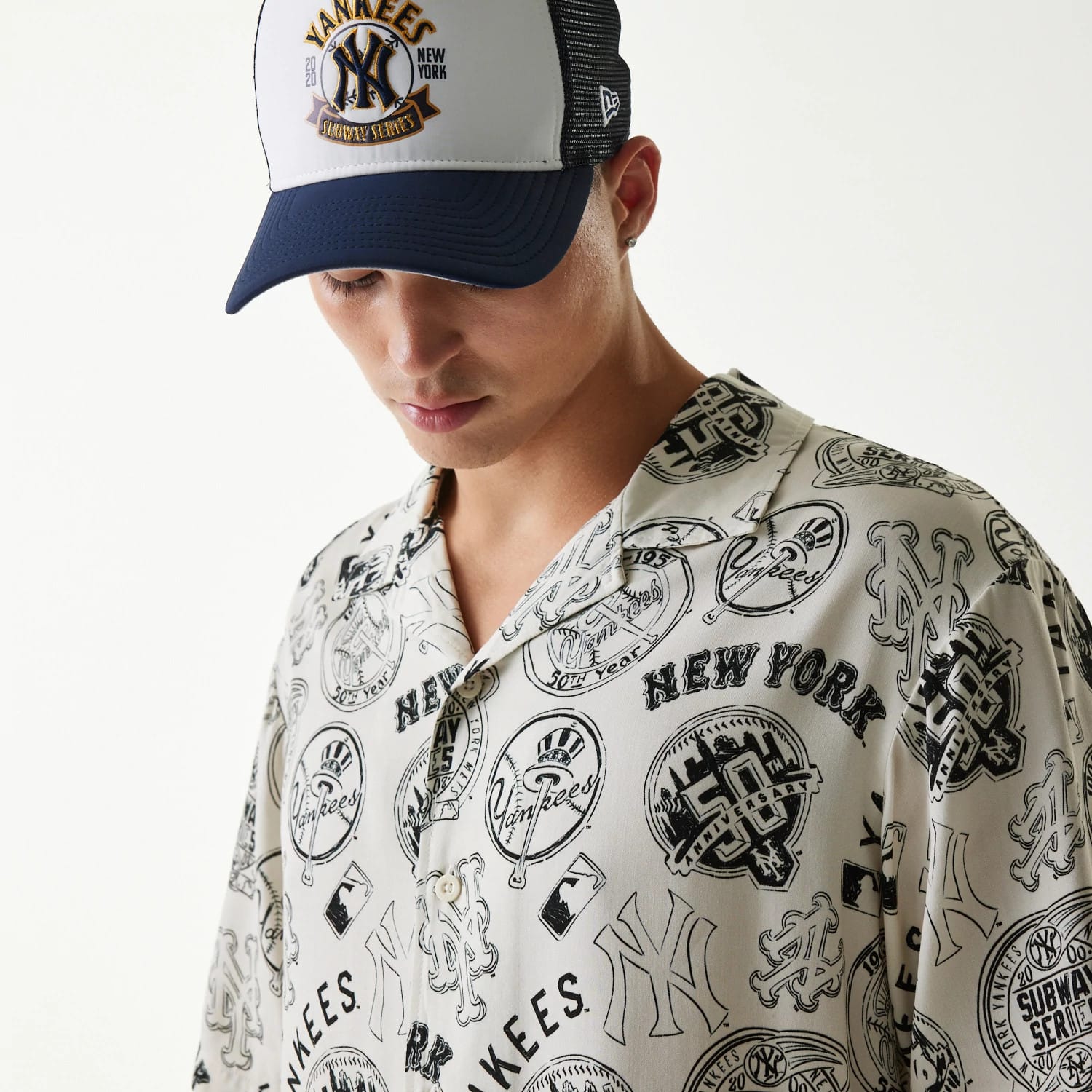 The Male model is wearing MLB Subway Series All Over Print Open White Short Sleeve Shirt 3