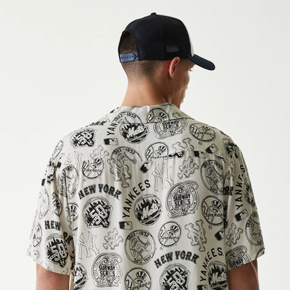 The Male model is wearing MLB Subway Series All Over Print Open White Short Sleeve Shirt 7