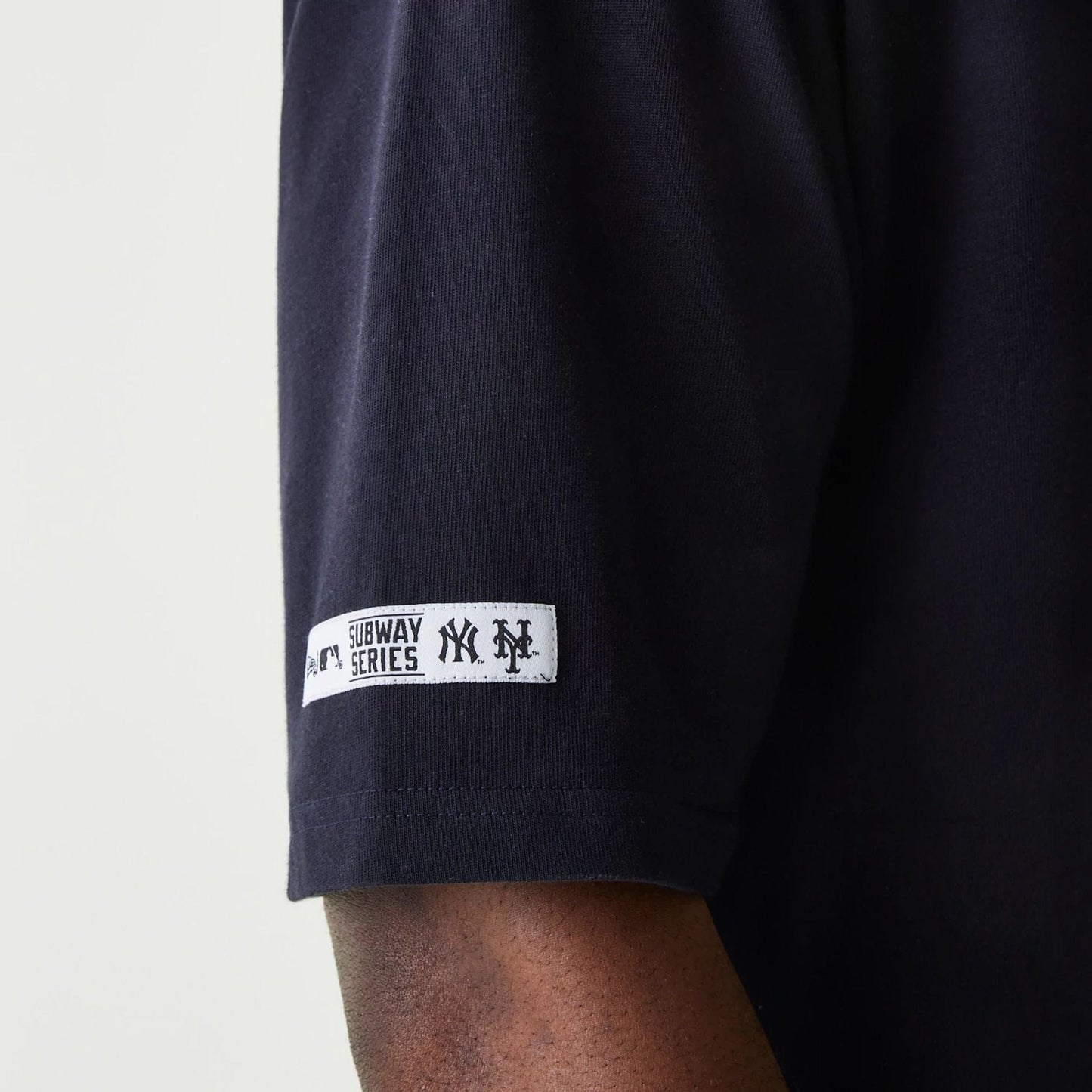The Male model is wearing MLB Subway Series Navy Oversized T-Shirt 5