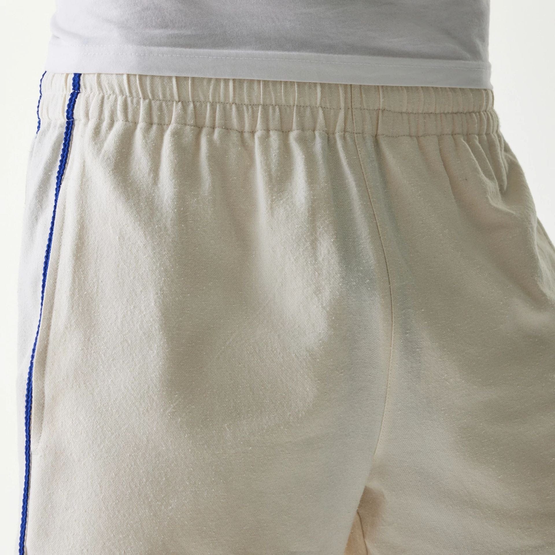 The Male model is wearing New York Mets MLB Piping Open Cream Shorts 6