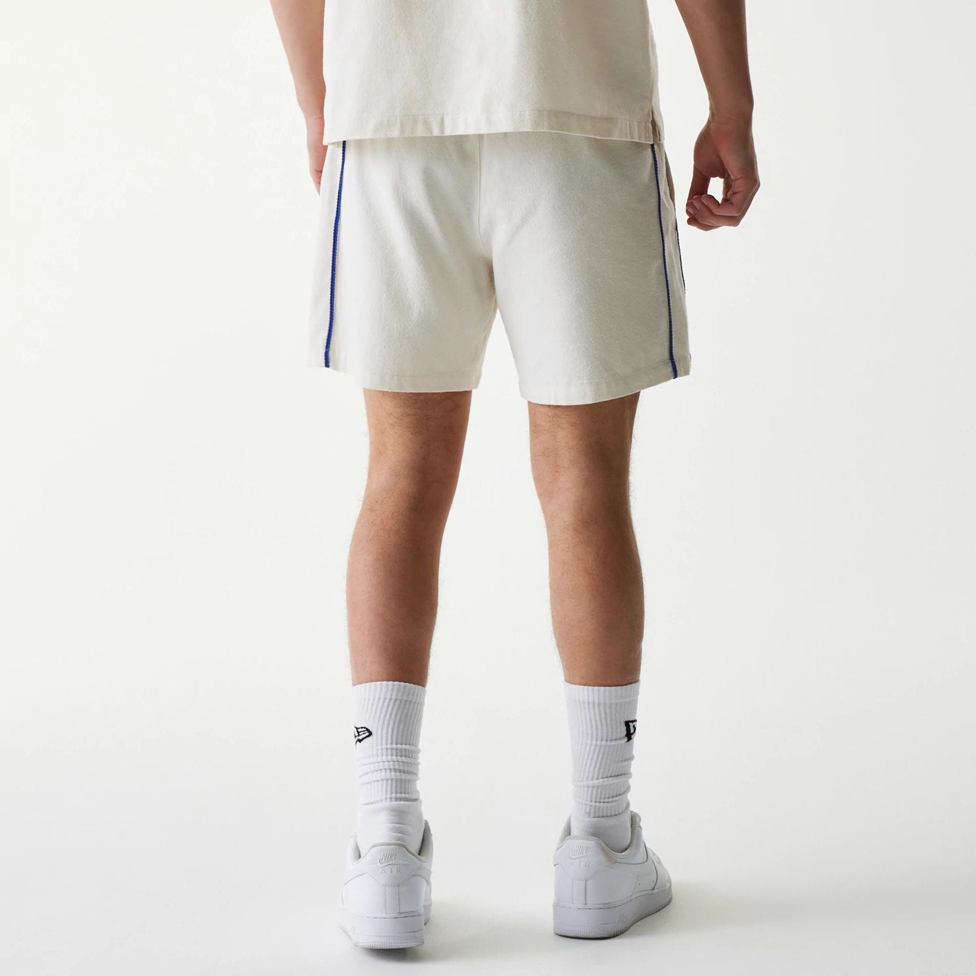 The Male model is wearing New York Mets MLB Piping Open Cream Shorts 2