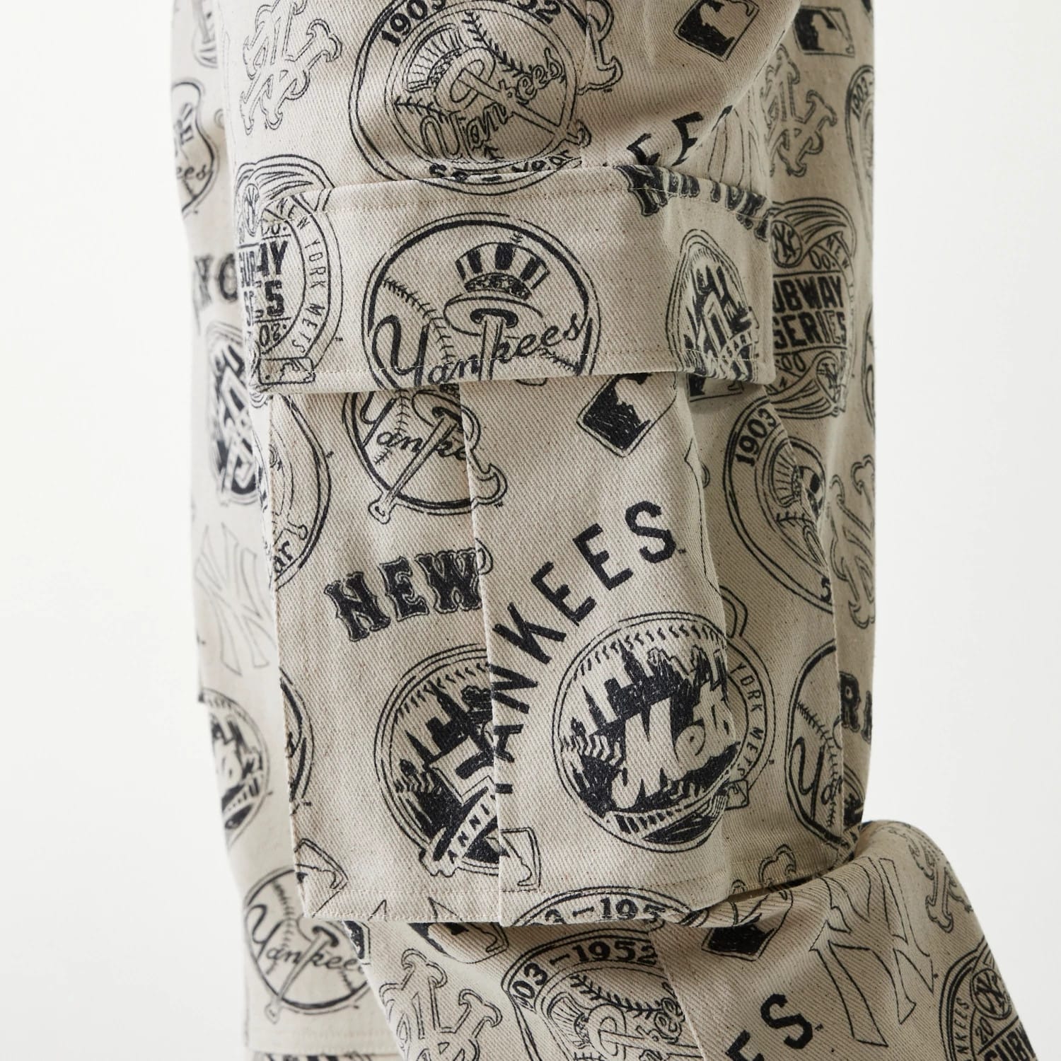 The Male model is wearing MLB Subway Series All Over Print Cargo Trousers 5