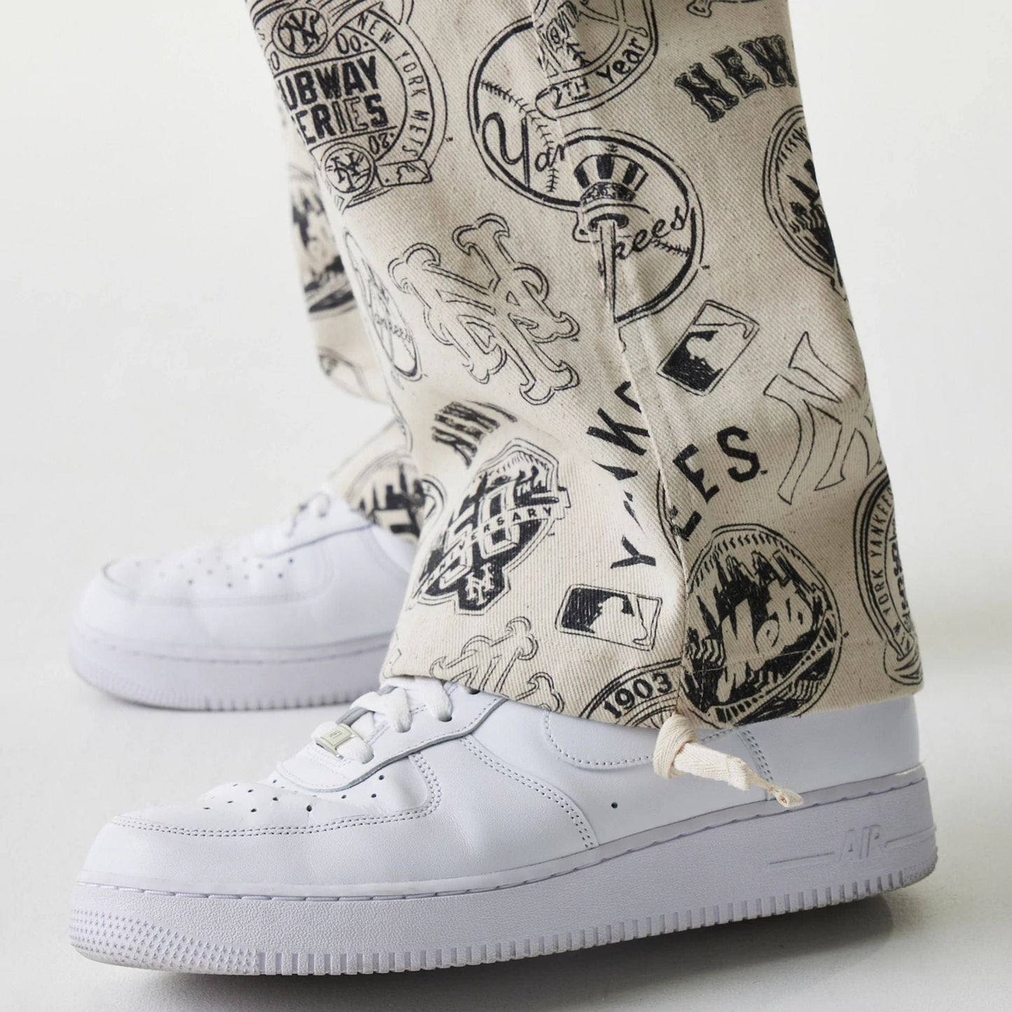 The Male model is wearing MLB Subway Series All Over Print Cargo Trousers 7