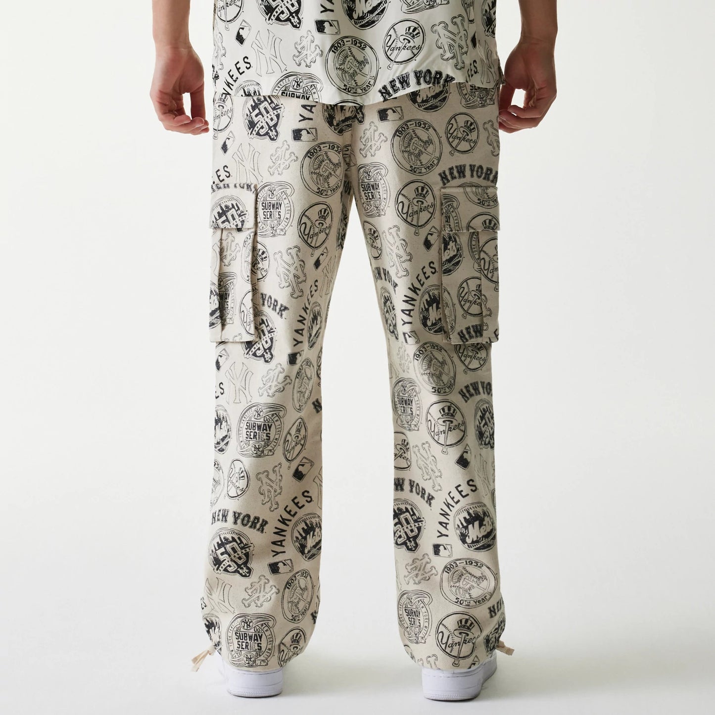 The Male model is wearing MLB Subway Series All Over Print Cargo Trousers 2