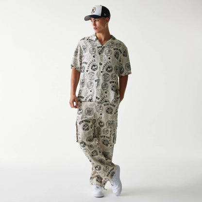 The Male model is wearing MLB Subway Series All Over Print Cargo Trousers 8