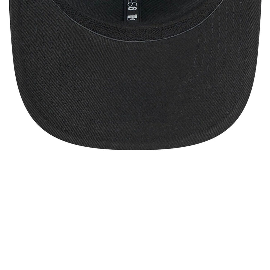 This is a Rangegoats LIV Golf 2025 Black 9SEVENTY Stretch Snap Adjustable Cap 7