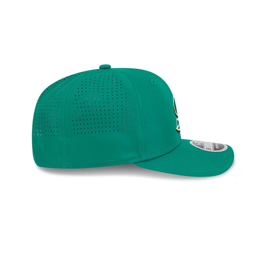 This is a Stinger LIV Golf 2025 Green 9SEVENTY Stretch Snap Adjustable Cap 5