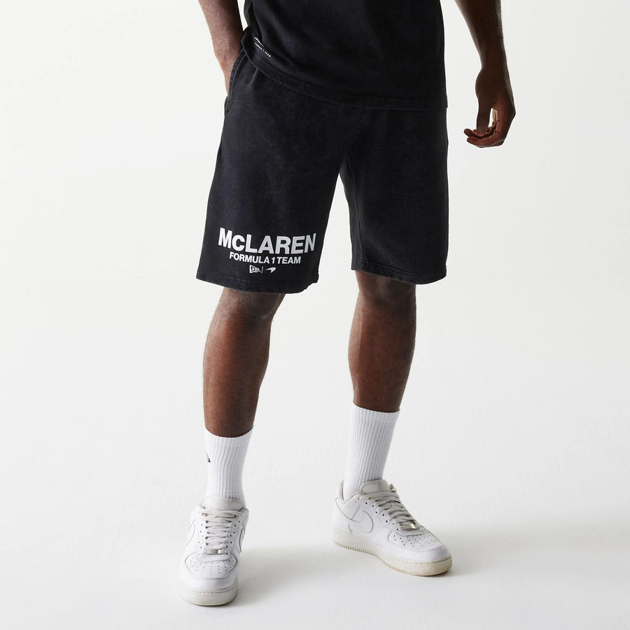 The Male model is wearing McLaren Racing Wordmark Black Oversized Shorts 1