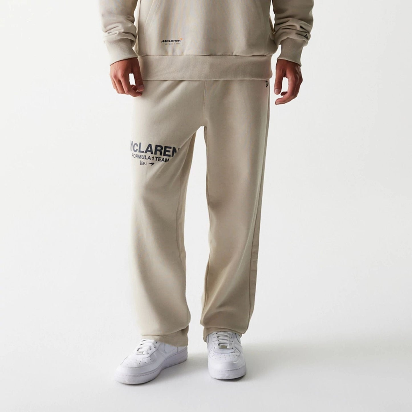 The Male model is wearing McLaren Racing Light Beige Straight Leg Joggers 7