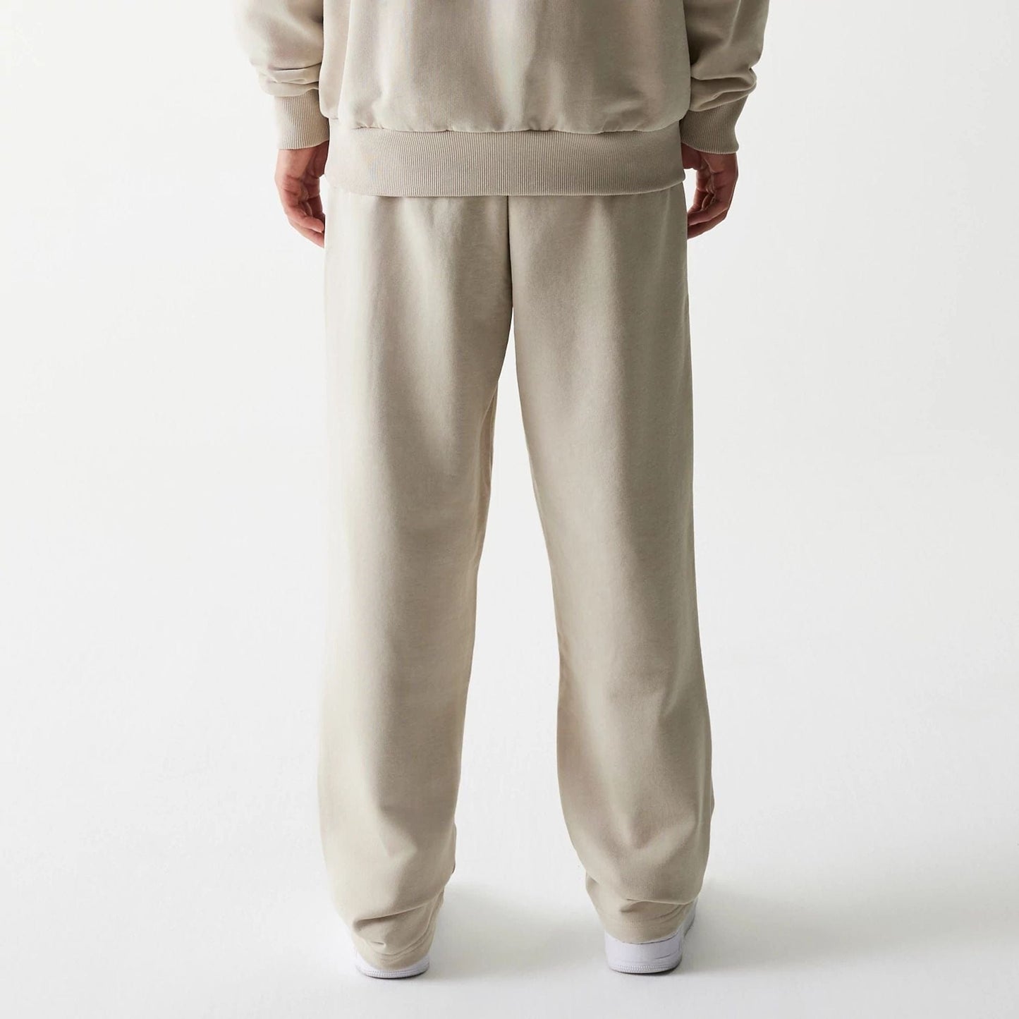 The Male model is wearing McLaren Racing Light Beige Straight Leg Joggers 2