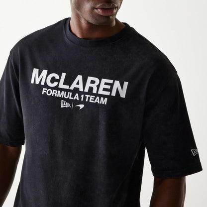 The Male model is wearing McLaren Racing Wordmark Black Oversized T-Shirt 3