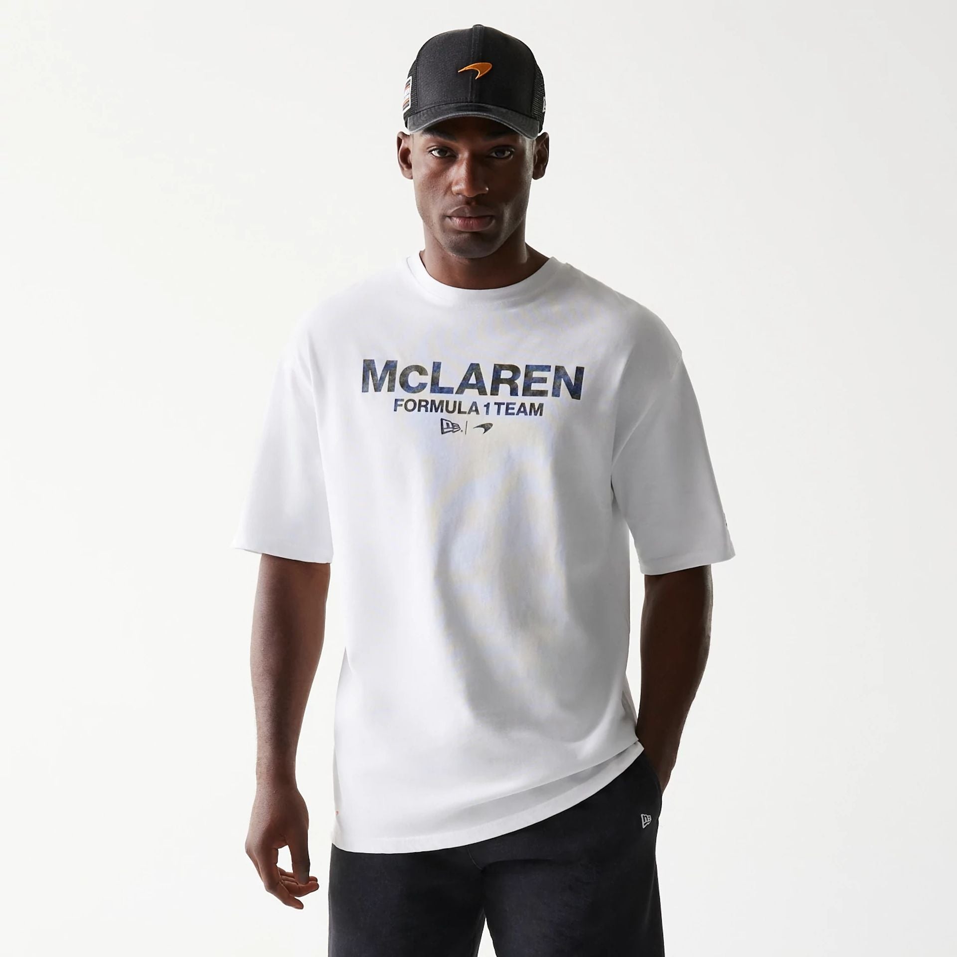 The Male model is wearing McLaren Racing Wordmark White Oversized T-Shirt 1