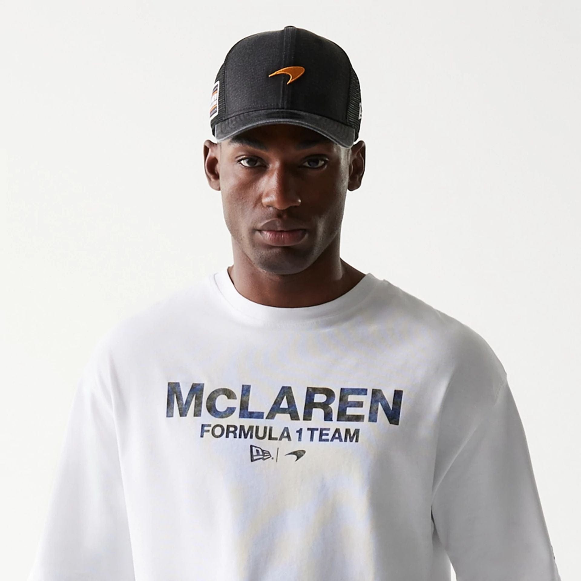 The Male model is wearing McLaren Racing Wordmark White Oversized T-Shirt 6