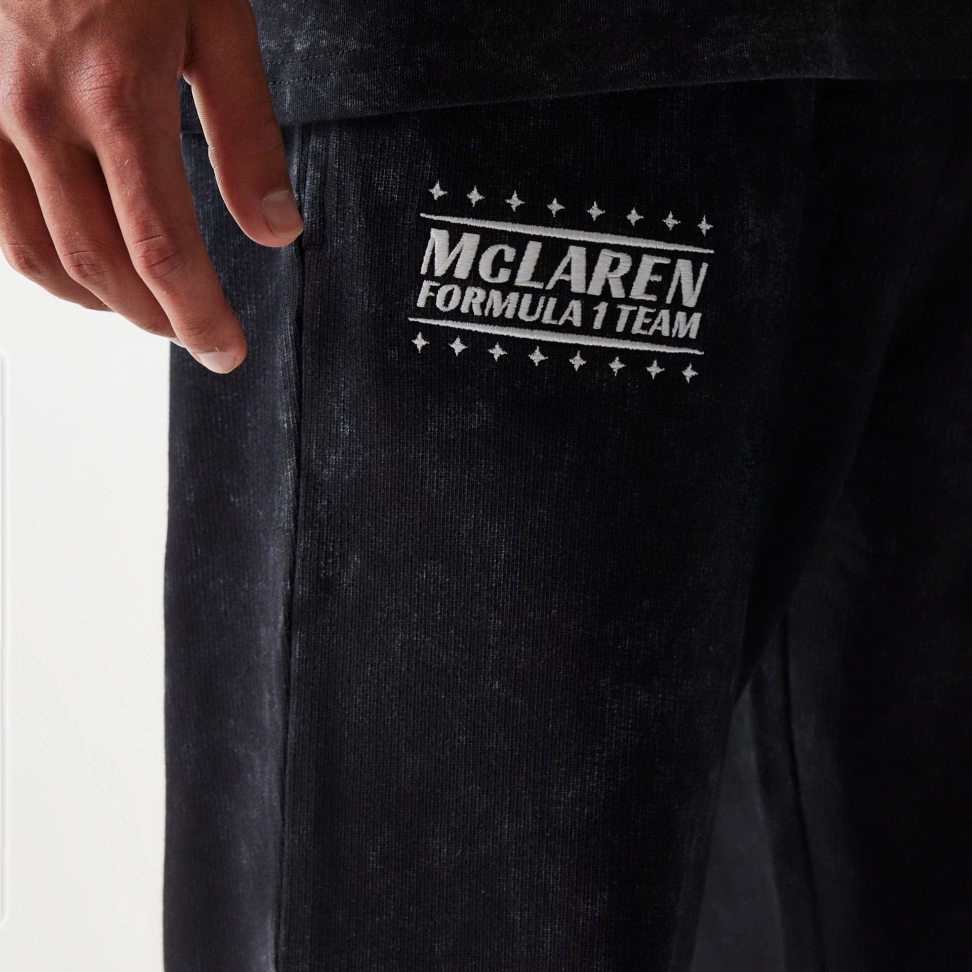 The Male model is wearing McLaren Racing Black Straight Leg Joggers 3