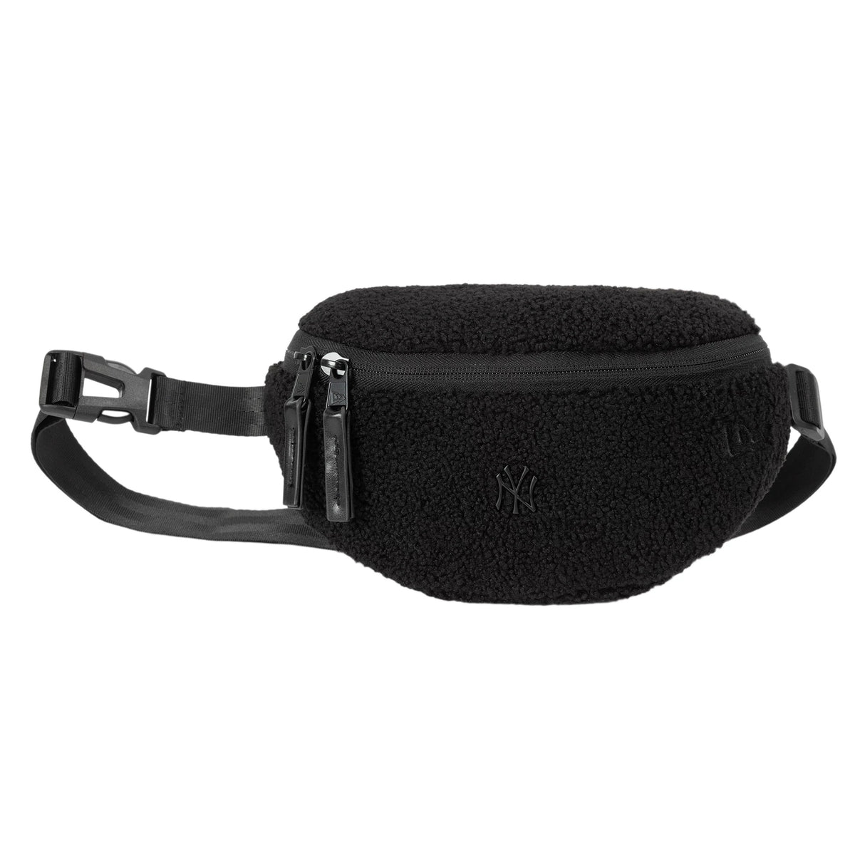 New Era New York Yankees MLB Borg Pin Black Waist Bag, side view displaying the fluffy black texture with a zip closure, a debossed NY logo on the front, and an adjustable strap with a buckle on the side.