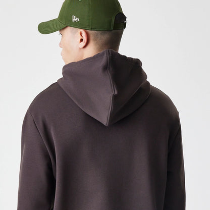 The Male model is wearing New York Yankees MLB Midi League Essential Dark Brown Oversized Pullover Hoodie 4
