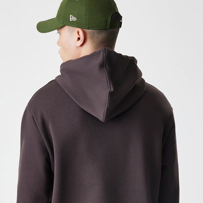 The Male model is wearing New York Yankees MLB Midi League Essential Dark Brown Oversized Pullover Hoodie 4