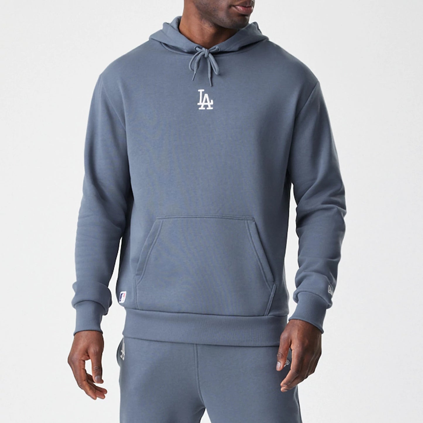 The Male model is wearing LA Dodgers MLB Midi League Essential Dark Grey Oversized Pullover Hoodie 3