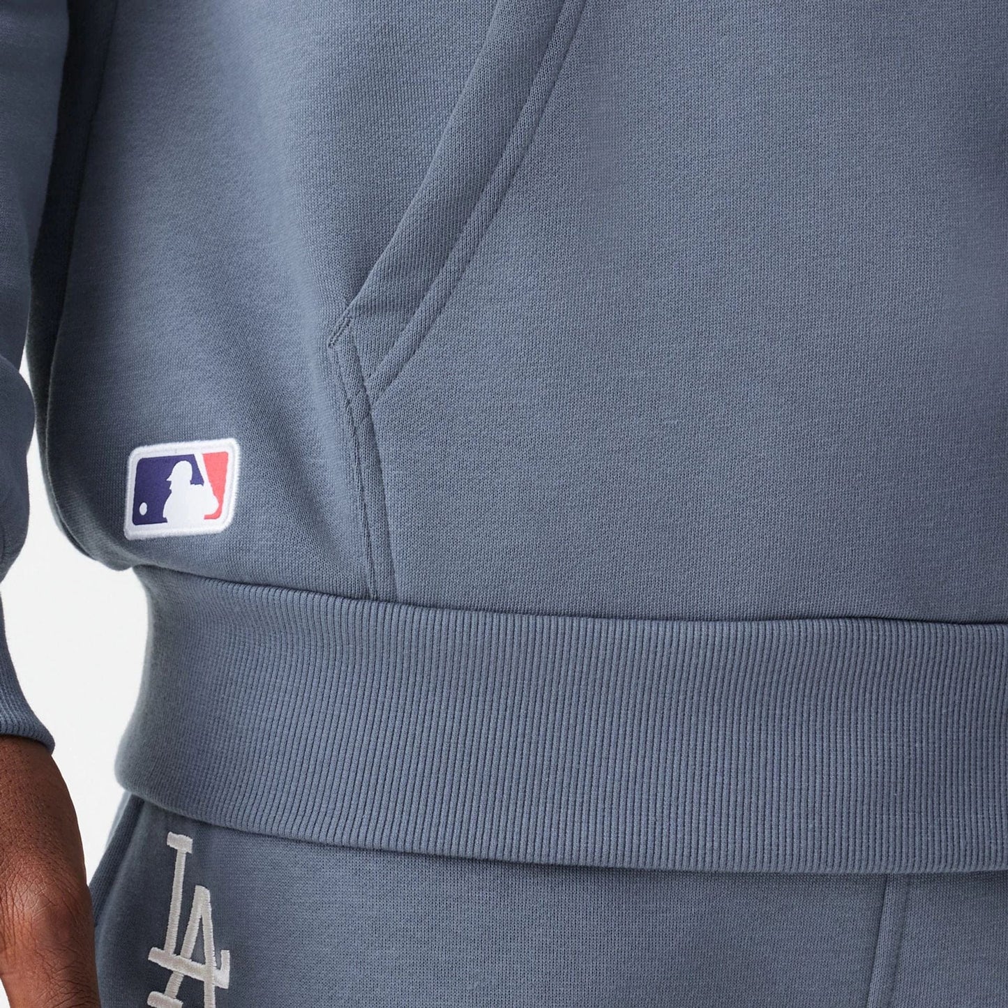 The Male model is wearing LA Dodgers MLB Midi League Essential Dark Grey Oversized Pullover Hoodie  7