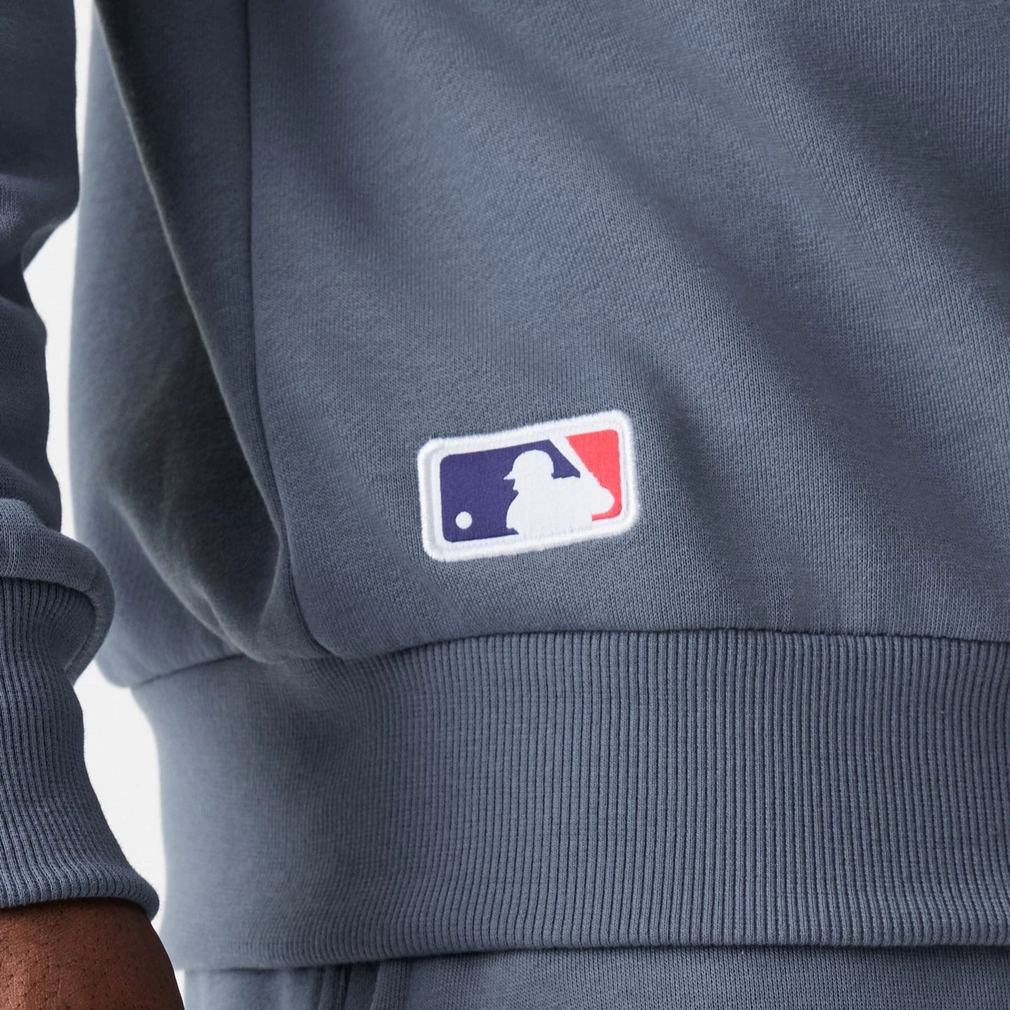 The Male model is wearing LA Dodgers MLB Midi League Essential Dark Grey Oversized Crew Neck Sweater 6