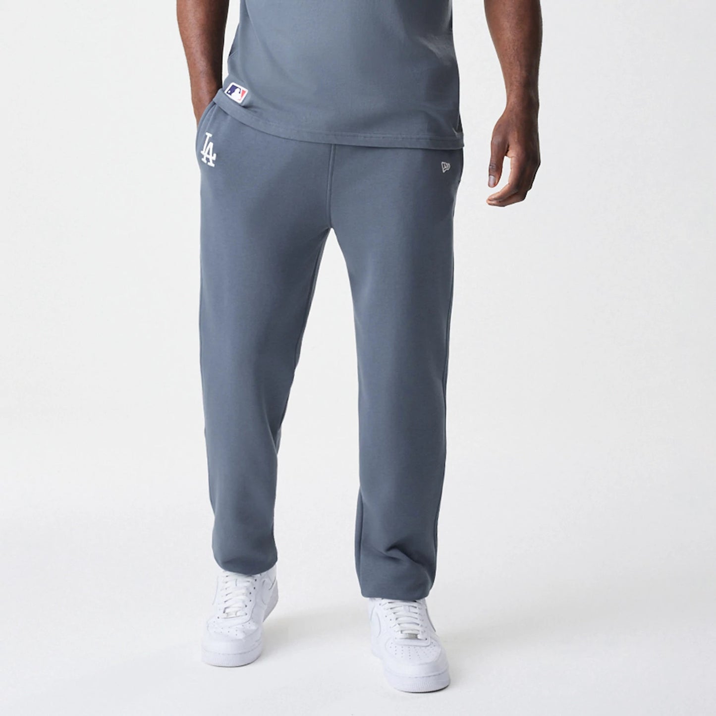 The Male model is wearing LA Dodgers MLB Midi League Essential Dark Grey Joggers 6