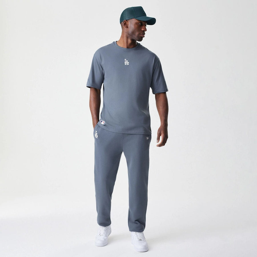 The Male model is wearing LA Dodgers MLB Midi League Essential Dark Grey Joggers  8
