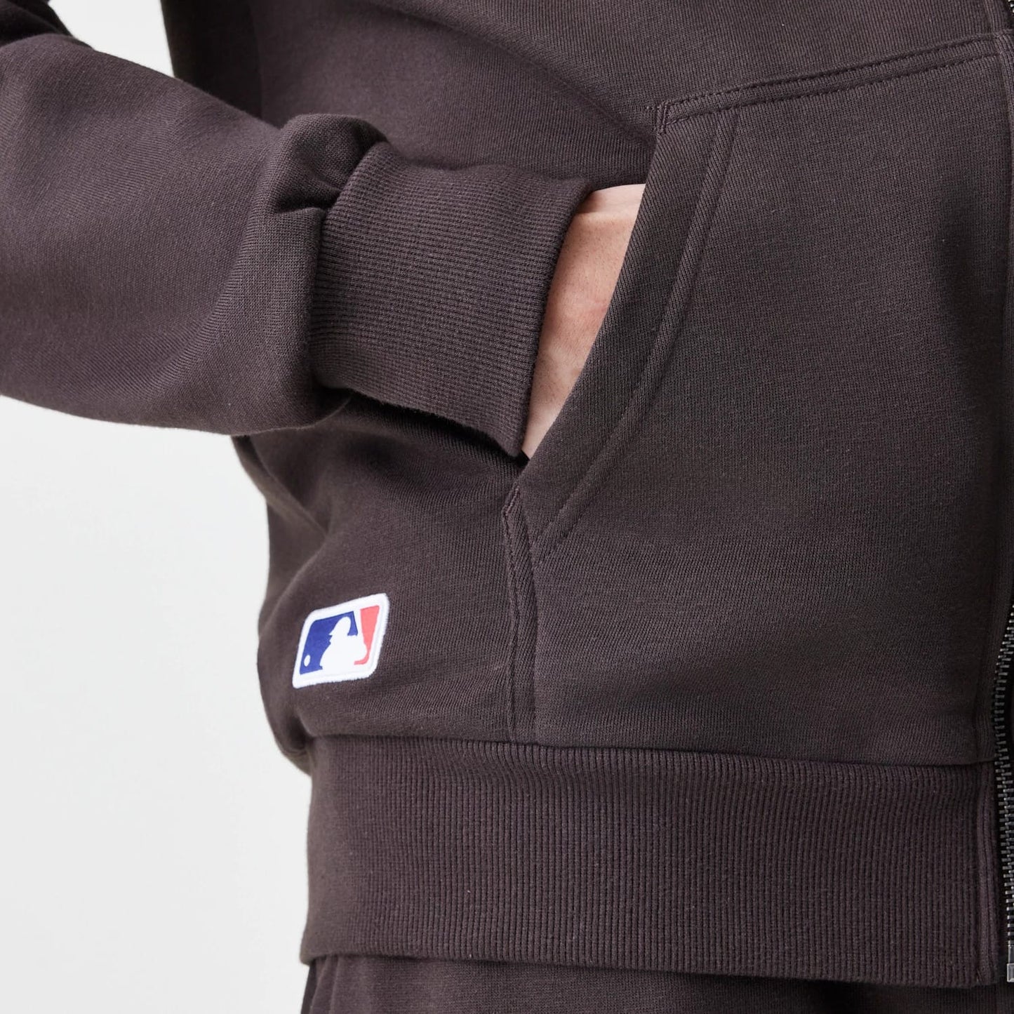 The Male model is wearing New York Yankees MLB Midi League Essential Dark Brown Full Zip Hoodie 4
