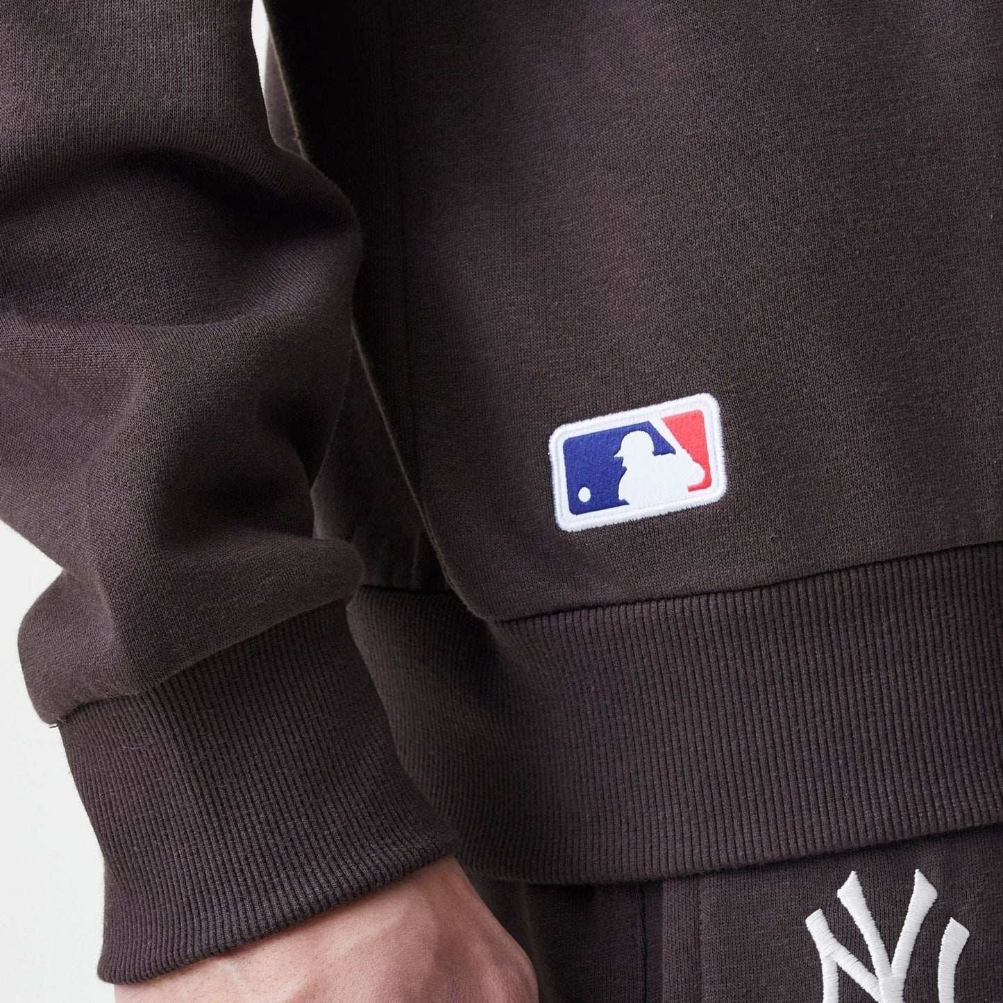The Male model is wearing New York Yankees MLB Midi League Essential Dark Brown Oversized Crew Neck Sweater  6