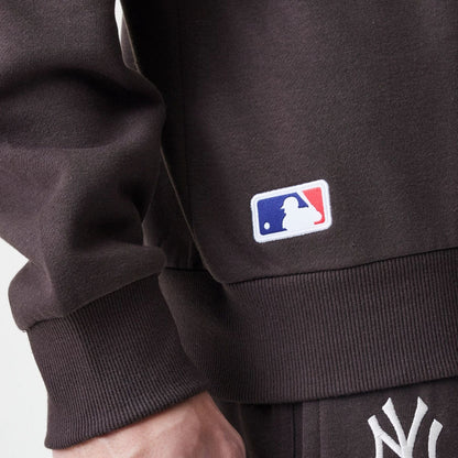 The Male model is wearing New York Yankees MLB Midi League Essential Dark Brown Oversized Crew Neck Sweater  6