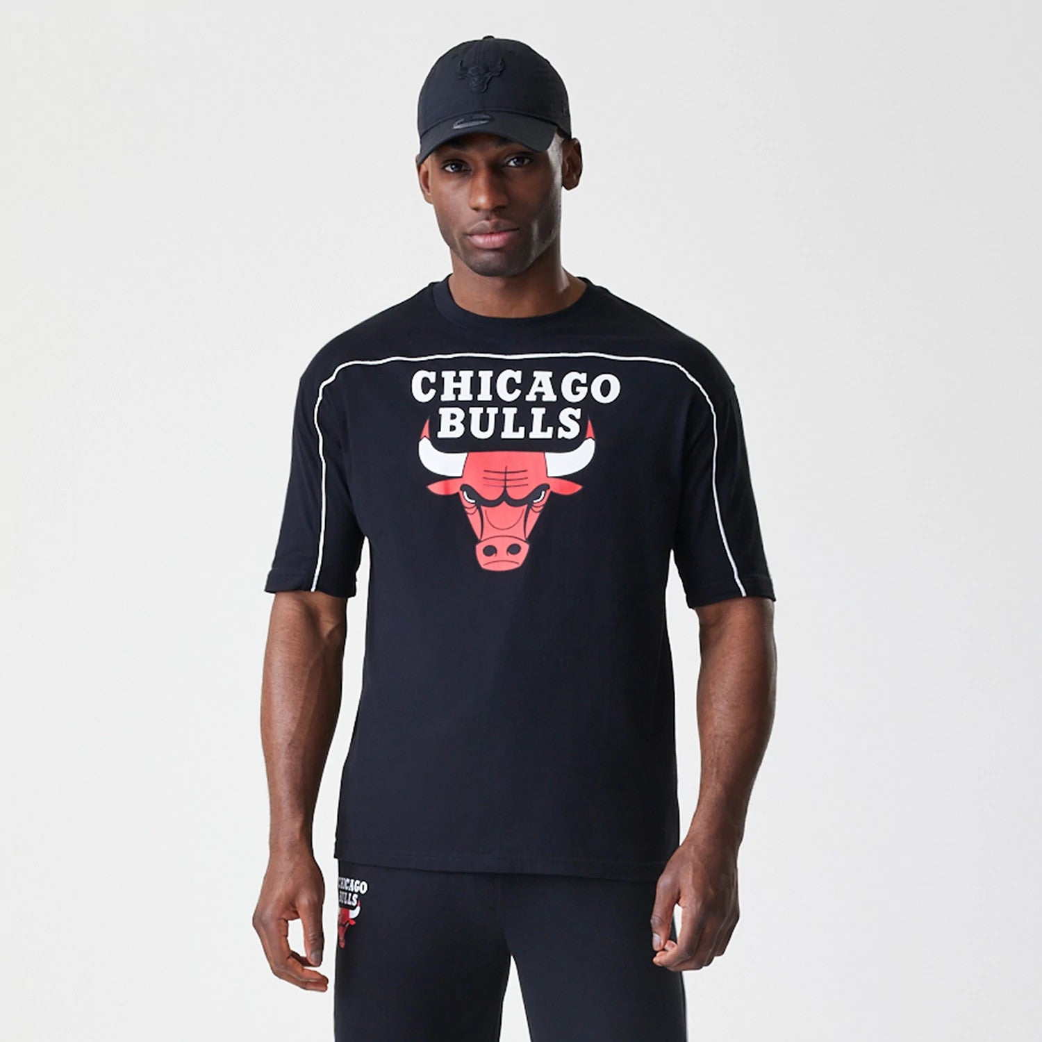 The Male model is wearing Chicago Bulls NBA Piping Black Oversized T-Shirt 3