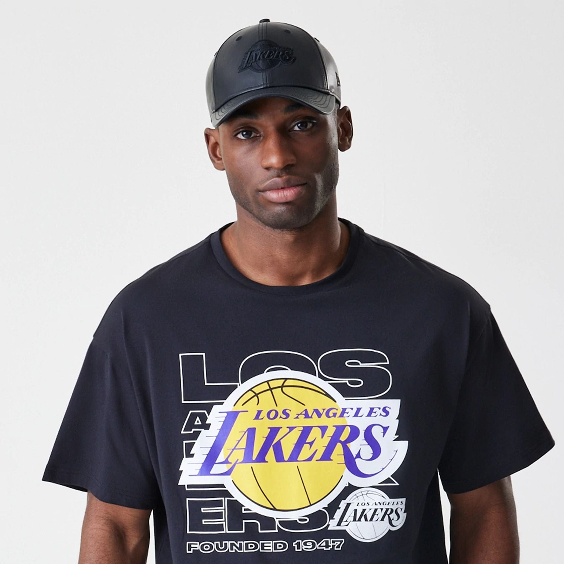 The Male model is wearing LA Lakers NBA Outline Graphic Navy Oversized T-Shirt  6