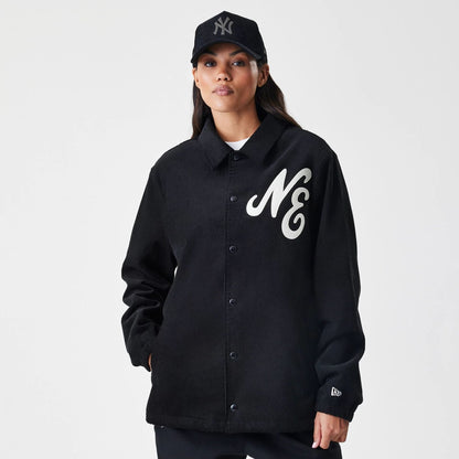 The Male model is wearing  New Era Cord Black Coaches Jacket  4