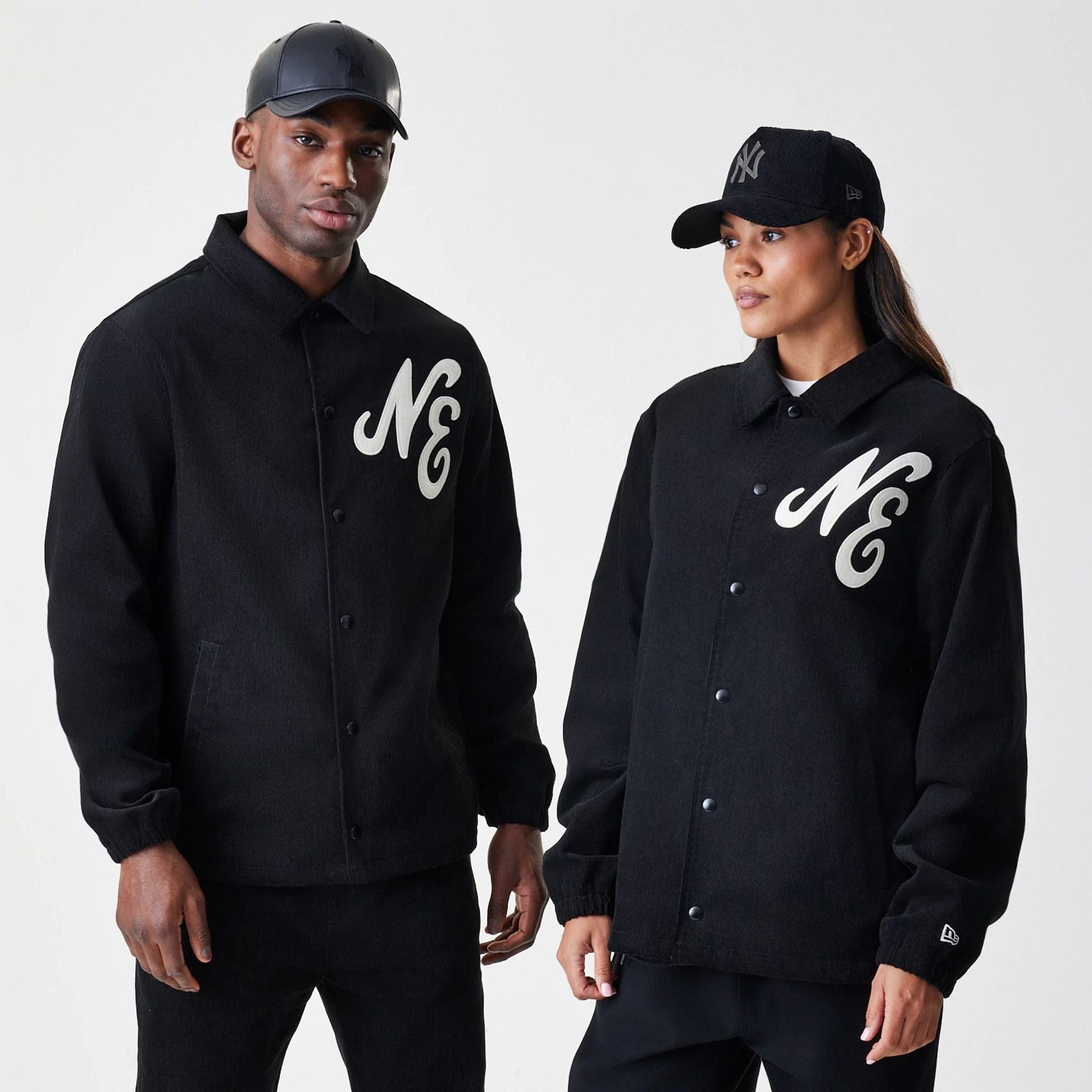 The Male model is wearing  New Era Cord Black Coaches Jacket  1