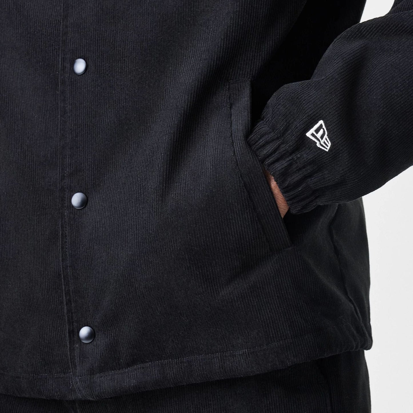 The Male model is wearing  New Era Cord Black Coaches Jacket  7